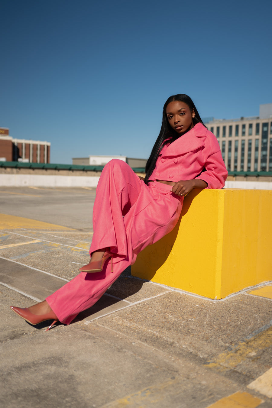 Chic High Class Suits. Wrap Jacket with flare pants.
